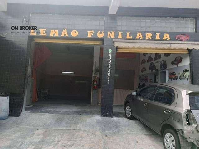 Garagem comercial térrea, funcionamento de funilaria e uma casa de fundo no terreno, Ótima localização comercial e residencial. Vista panorâmica .