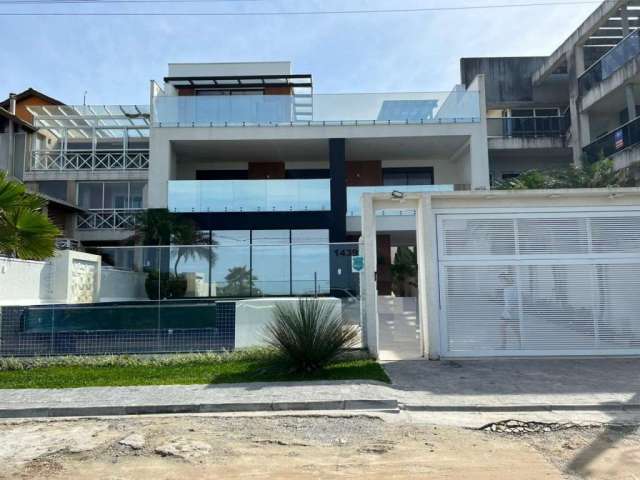 Tríplex de frente ao mar com 4 suites mais 3 quartos e piscina a venda em Guaratuba PR, mobiliado