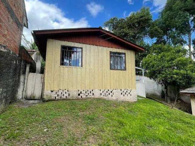 Terreno á venda com casa no bairro Colônia São Venâncio em Almirante Tamandaré - PR.