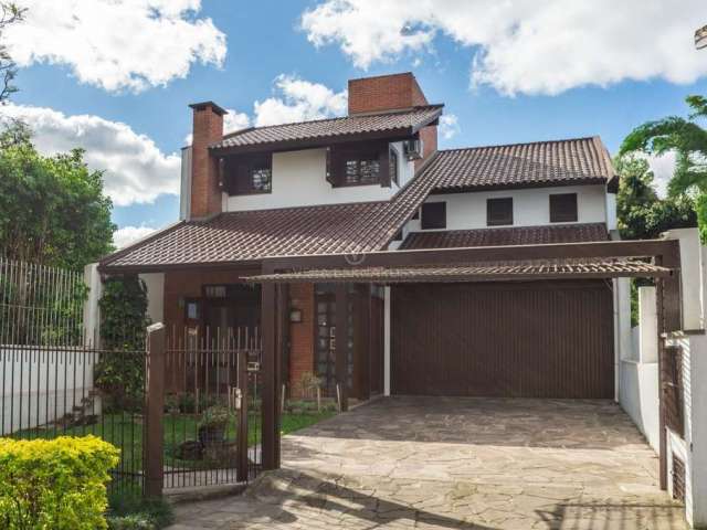 Casa com 3 quartos à venda na Rua Almirante Delamare, 170, Tristeza, Porto Alegre por R$ 1.300.000