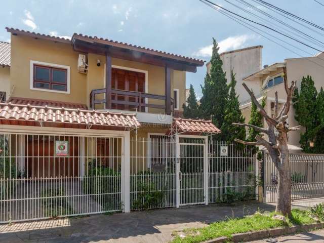 Casa com 3 quartos à venda na Rua Cícero Viana, 85, Aberta dos Morros, Porto Alegre por R$ 790.000