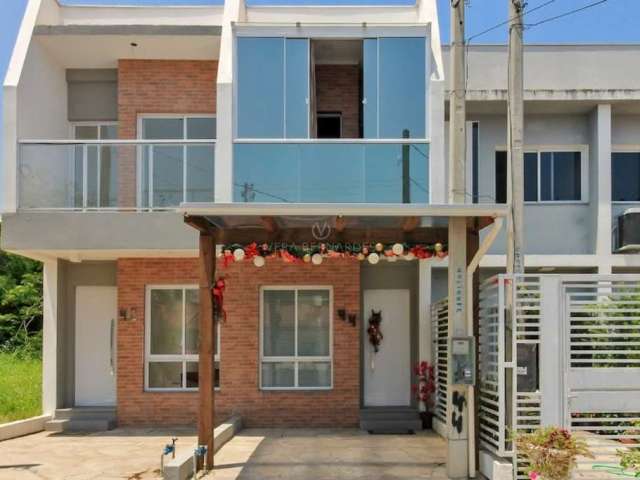 Casa com 2 quartos à venda na Rua Vacaria, 44, Hípica, Porto Alegre por R$ 550.000