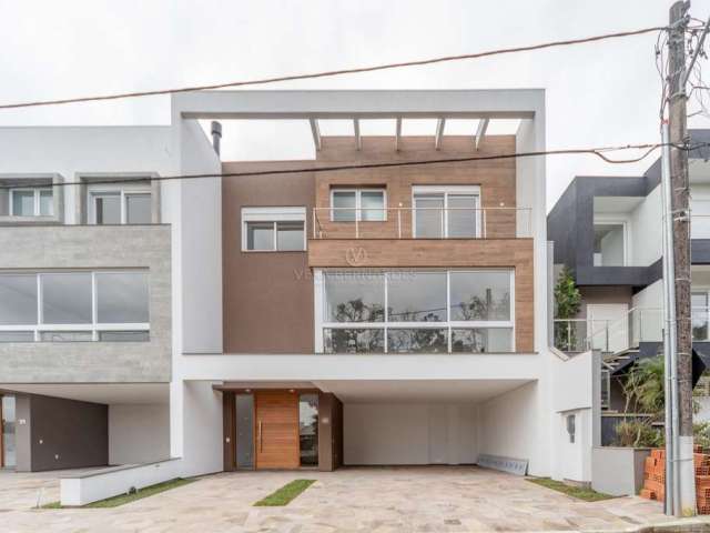 Casa em condomínio fechado com 3 quartos à venda na Rua Ivo Walter Kern, 599, Hípica, Porto Alegre por R$ 1.670.000