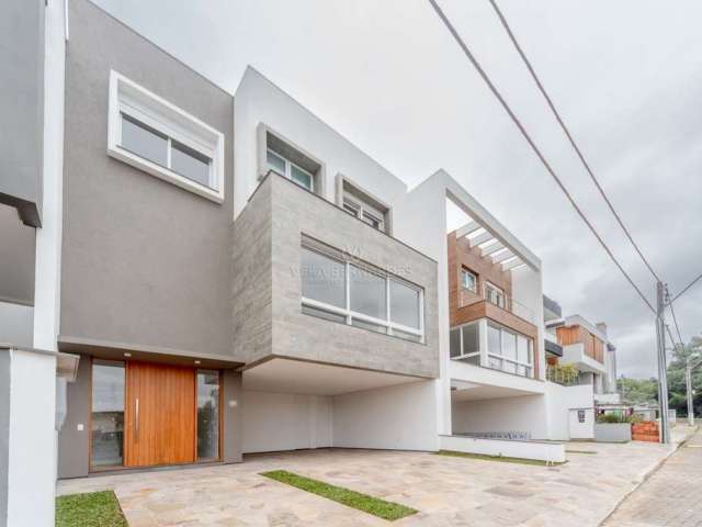 Casa em condomínio fechado com 3 quartos à venda na Rua Ivo Walter Kern, 599, Hípica, Porto Alegre por R$ 1.595.000