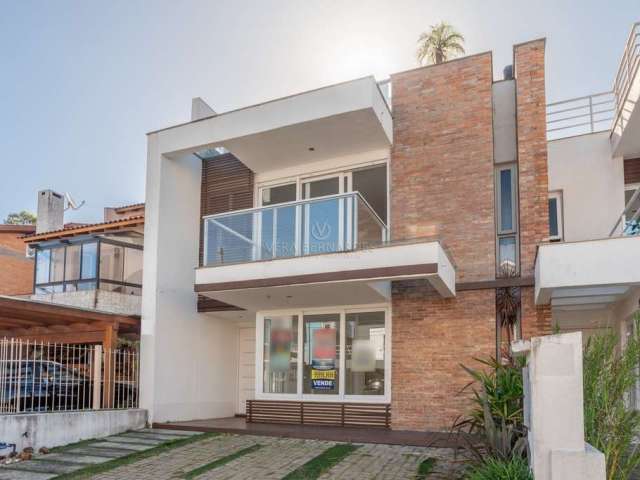 Casa em condomínio fechado com 3 quartos à venda na Rua Carlos Maximiliano Fayet, 80, Hípica, Porto Alegre por R$ 818.000