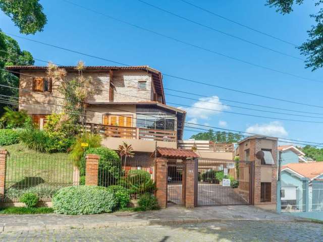 Casa em condomínio fechado com 3 quartos à venda na Rua Doutor David de Azevedo Gusmão, 185, Jardim Isabel, Porto Alegre por R$ 1.060.000