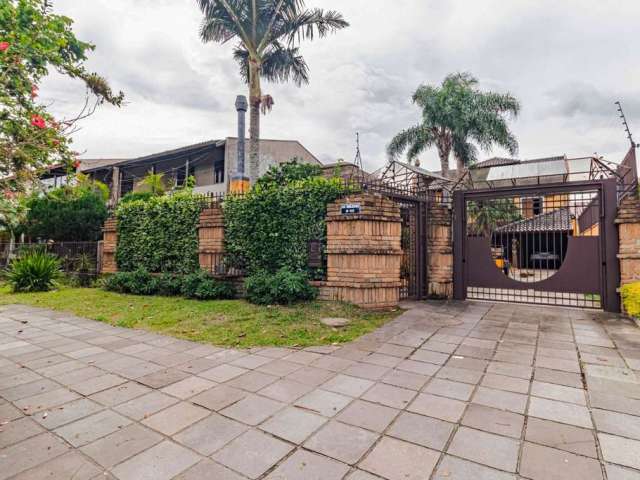 Casa com 3 quartos à venda na Avenida Orleaes, 492, Guarujá, Porto Alegre por R$ 2.000.000