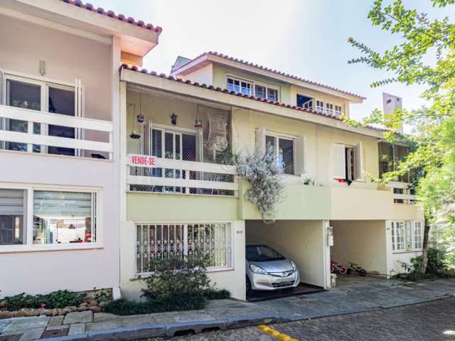 Casa em condomínio fechado com 3 quartos à venda na Rua Padre João Batista Reus, 983, Tristeza, Porto Alegre por R$ 950.000