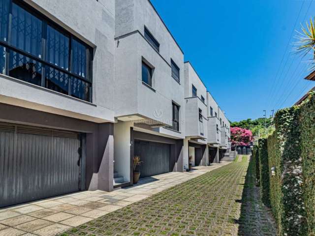 Casa em condomínio fechado com 3 quartos à venda na Rua Padre João Batista Reus, 1300, Camaquã, Porto Alegre por R$ 790.000