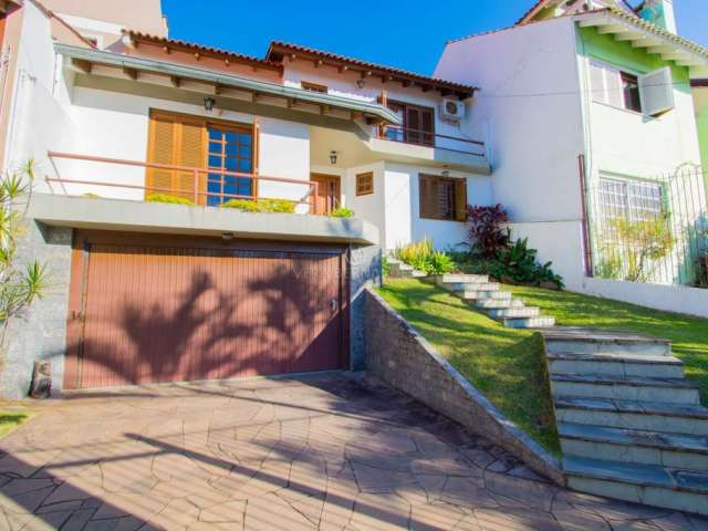 Casa com 3 quartos à venda na Rua Professora Thereza Noronha, 65, Espírito Santo, Porto Alegre por R$ 750.000