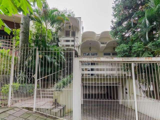 Casa com 6 quartos à venda na Avenida Icaraí, 72, Cristal, Porto Alegre por R$ 1.570.000