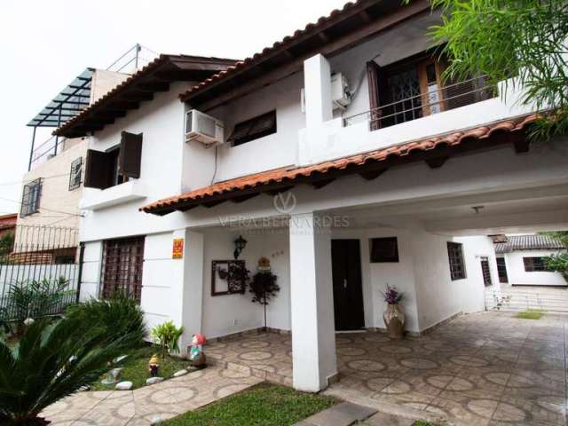 Casa com 3 quartos à venda na Rua Professor Doutor João Pitta Pinheiro Filho, 302, Camaquã, Porto Alegre por R$ 600.000