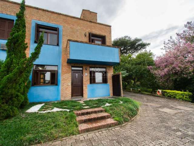 Casa em condomínio fechado com 2 quartos à venda na Avenida Vicente Monteggia, 2212, Cavalhada, Porto Alegre por R$ 450.000