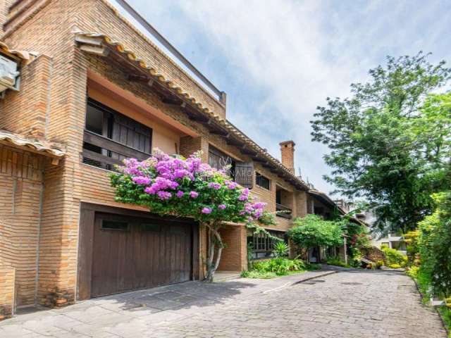 Casa em condomínio fechado com 4 quartos à venda na Rua Carlos Júlio Becker, 295, Tristeza, Porto Alegre por R$ 1.100.000