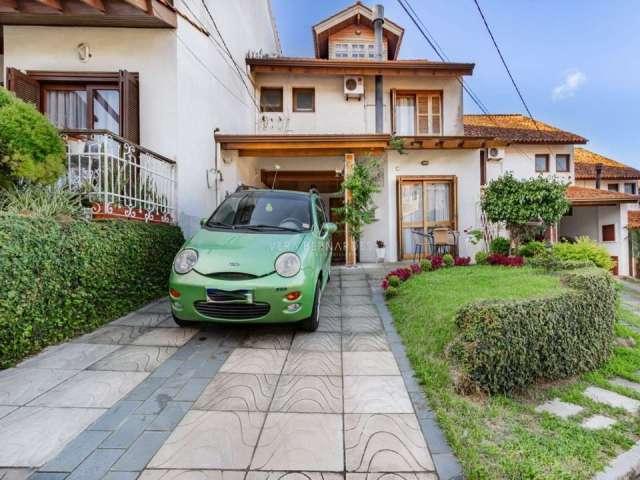 Casa em condomínio fechado com 3 quartos à venda na Avenida Eduardo Prado, 695, Cavalhada, Porto Alegre por R$ 750.000