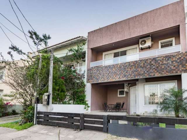 Casa em condomínio fechado com 3 quartos à venda na Rua Fernando Jorge Schneider, 757, Hípica, Porto Alegre por R$ 689.000