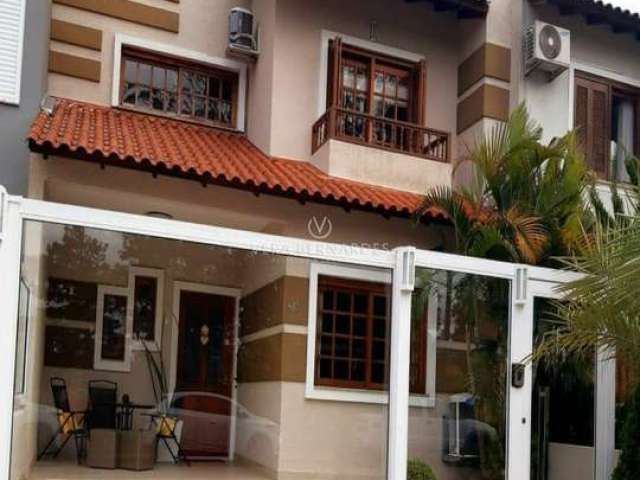 Casa em condomínio fechado com 2 quartos à venda na Rua Fernando Jorge Schneider, 741, Hípica, Porto Alegre por R$ 795.000