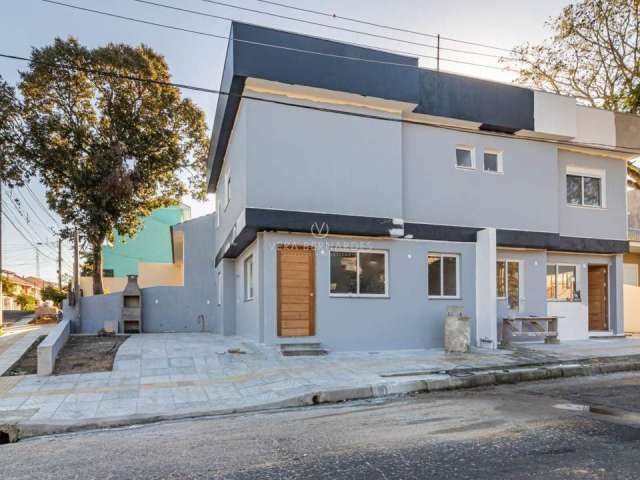 Casa com 3 quartos à venda na Rua Helio Felix Frey, 114, Espírito Santo, Porto Alegre por R$ 417.000