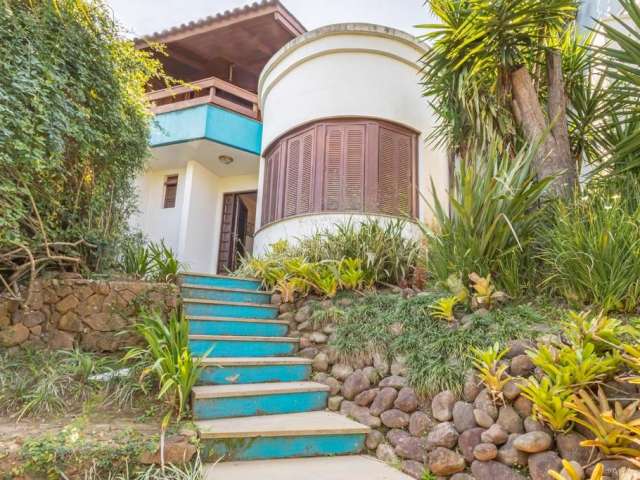 Casa com 3 quartos à venda na Rua Edgar Luiz Schneider, 100, Jardim Isabel, Porto Alegre por R$ 1.800.000