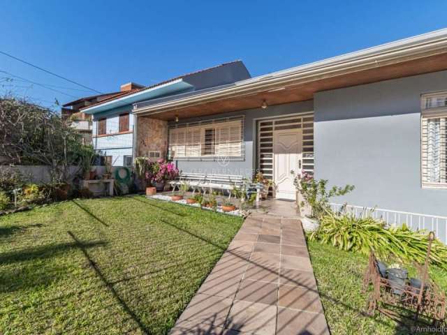 Casa com 4 quartos à venda na Rua Caeté, 1000, Vila Assunção, Porto Alegre por R$ 1.450.000