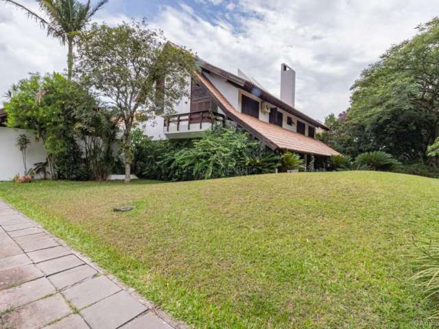 Casa em condomínio fechado com 6 quartos à venda na Avenida da Cavalhada, 5205, Cavalhada, Porto Alegre por R$ 4.000.000