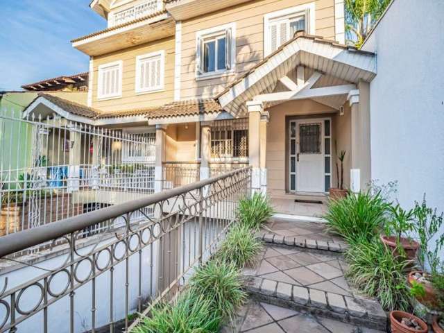 Casa com 4 quartos à venda na Avenida Arlindo Pasqualini, 363, Jardim Isabel, Porto Alegre por R$ 990.000