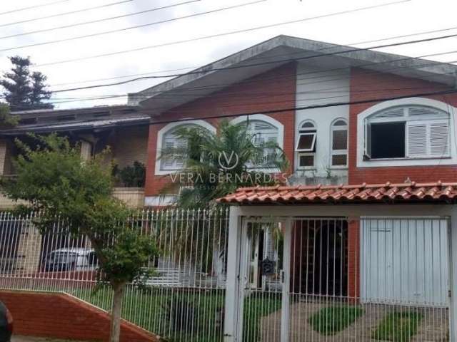 Casa com 3 quartos à venda na Rua Vicente Failace, 466, Tristeza, Porto Alegre por R$ 890.000