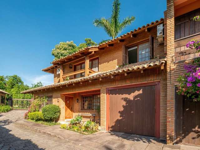 Casa em condomínio fechado com 3 quartos à venda na Rua Carlos Júlio Becker, 295, Tristeza, Porto Alegre por R$ 820.000