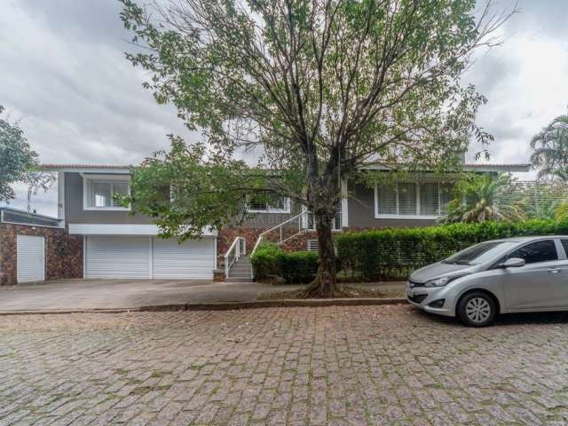 Casa com 3 quartos à venda na Rua Morano Calabro, 570, Jardim Isabel, Porto Alegre por R$ 1.800.000