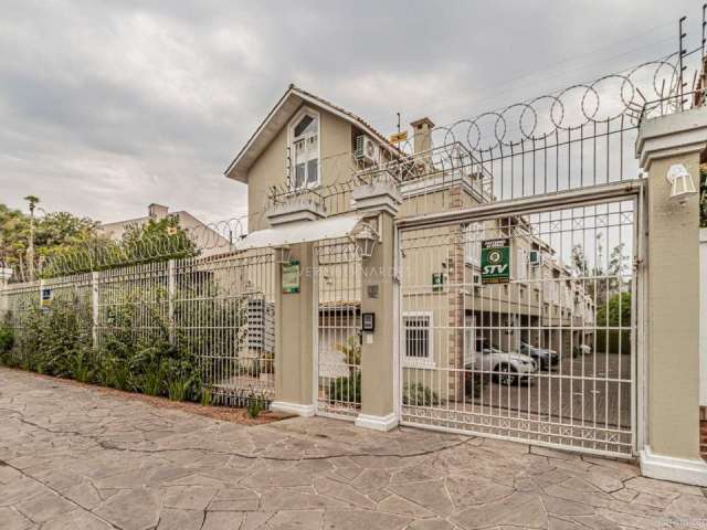 Casa em condomínio fechado com 3 quartos à venda na Rua Conselheiro Xavier da Costa, 3445, Ipanema, Porto Alegre por R$ 510.000