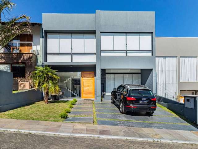 Casa em condomínio fechado com 3 quartos à venda na Rua Francisco Solano Borges, 200, Hípica, Porto Alegre por R$ 1.690.000