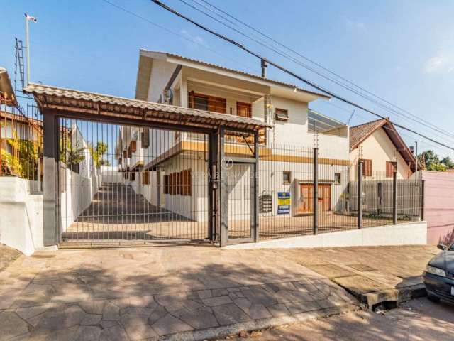 Casa em condomínio fechado com 3 quartos à venda na Rua Victor Silva, 515, Camaquã, Porto Alegre por R$ 680.000