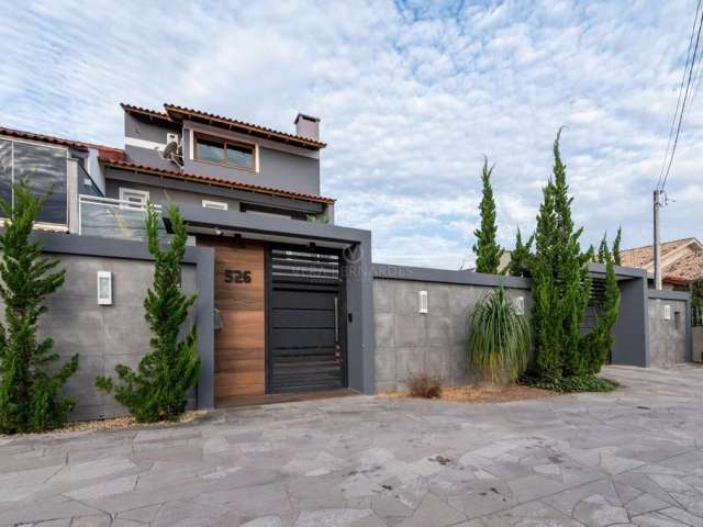 Casa com 3 quartos à venda na Rua Baldoino Bottini, 526, Hípica, Porto Alegre por R$ 1.500.000