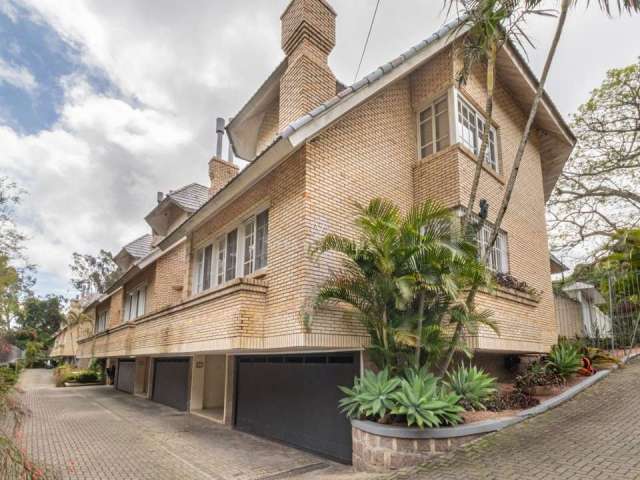 Casa em condomínio fechado com 3 quartos à venda na Rua Doutor Arnaldo da Silva Ferreira, 450, Jardim Isabel, Porto Alegre por R$ 1.250.000