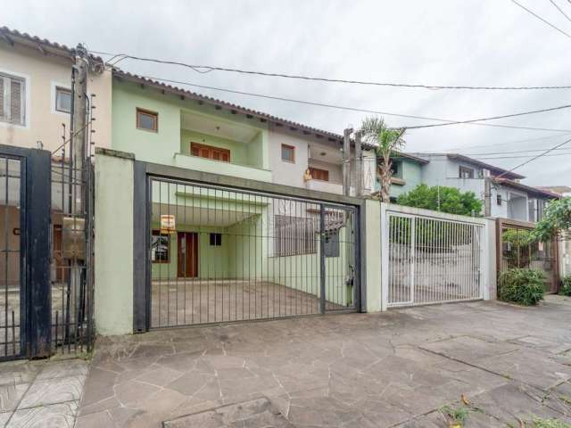 Casa com 3 quartos à venda na Rua Claudio da Silva Pinto, 72, Espírito Santo, Porto Alegre por R$ 695.000