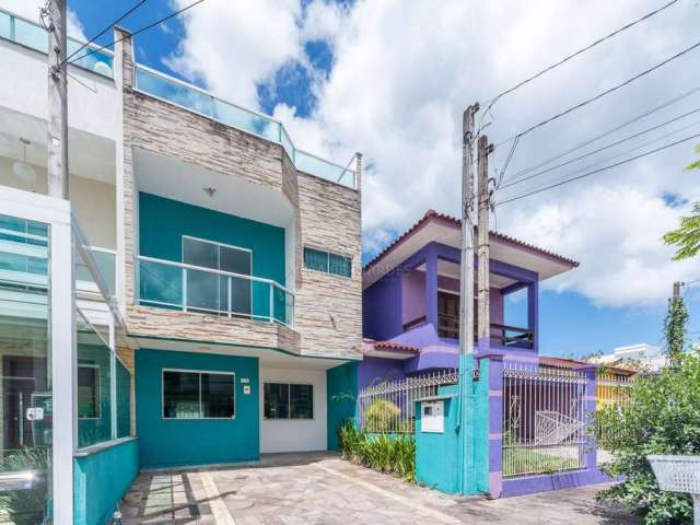 Casa com 3 quartos à venda na Rua Angico, 114, Hípica, Porto Alegre por R$ 619.000