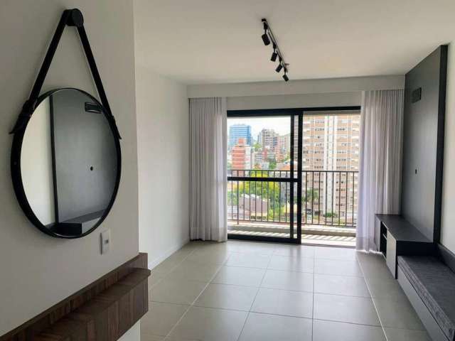 Apartamento com 1 dormitório para alugar, 53 m² por R$ 4.500/mês - Auxiliadora - Porto Alegre/RS