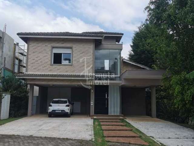 Casa para venda com 525 m², 3 suítes, lareira, sala de estar, cozinha e escritório no Condomínio Tamboré 10