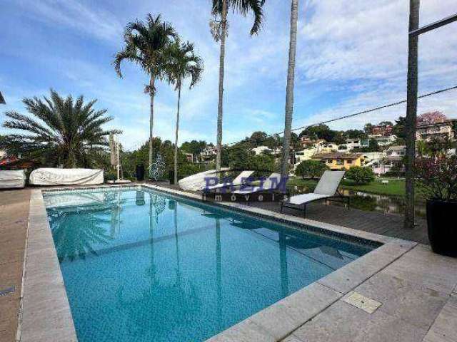 Casa térrea em frente ao lago, com 5 suítes no Cond. Marambaia.