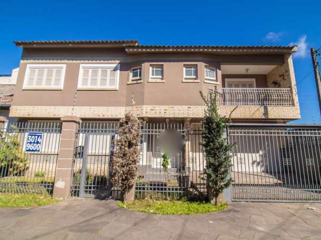 Casa em condomínio fechado com 4 quartos à venda na Rua Ari Marinho, 187, Higienópolis, Porto Alegre por R$ 1.290.000