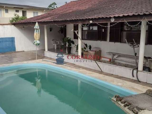 Casa com piscina e sala comercial a venda