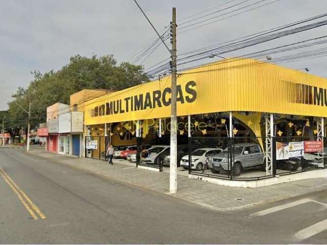 Ponto comercial de esquina em avenida principal, alugado pela Goodyear, com escritório nos fundos e