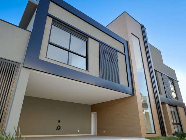 Casa alto padrão com 3 suítes, 344m² privativos, 3 vagas de garagem, no Cascatinha,