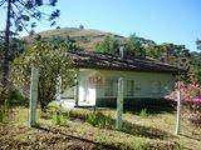 Casa com 3 dormitórios à venda, 236 m², área de 9.565 m2 por R$ 2.450.000 - Rancho Alegre - Campos do Jordão/SP