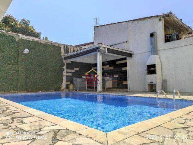 Casa com 4 dormitórios à venda, 180 m² por R$ 830.000,00 - Sumaré - Caraguatatuba/SP