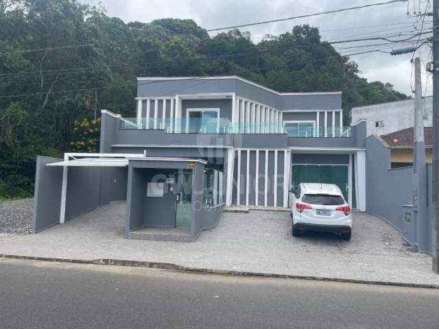 Casa com 4 quartos à venda na Rua dos Universitários, 79, Jardim Sofia, Joinville por R$ 1.350.000