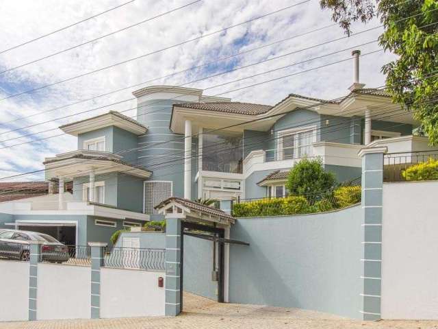 CASA EM CONDOMÍNIO FECHADO no SAGUAÇÚ com 4 quartos para VENDA, 600 m²