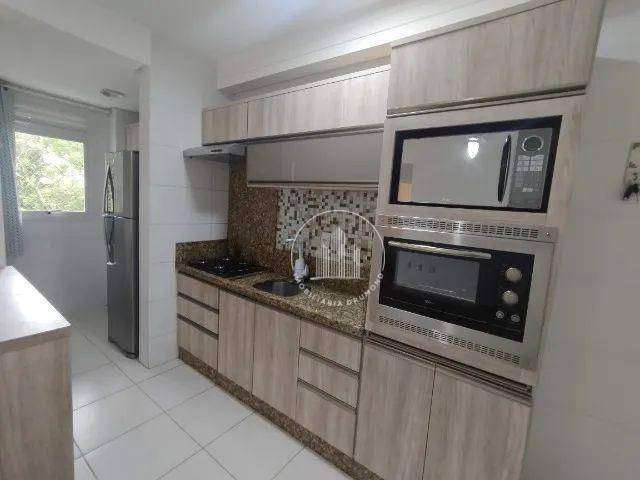 Apartamento com 2 dormitórios à venda, 63 m² por R$ 394.000,00 - Caminho Novo - Palhoça/SC