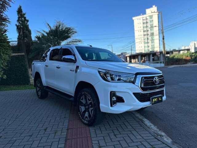 Toyota Hilux SRX 2.8 - Branca - 2018/2019