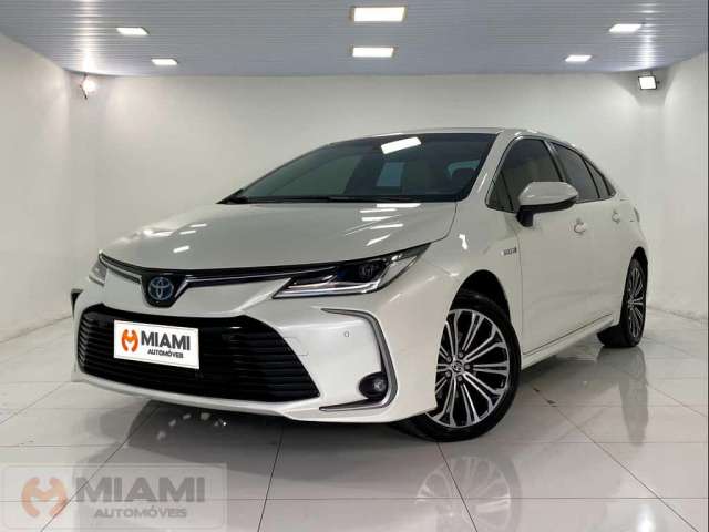 Toyota Corolla Altis Premium Hybrid 1.8 - Branca - 2020/2021